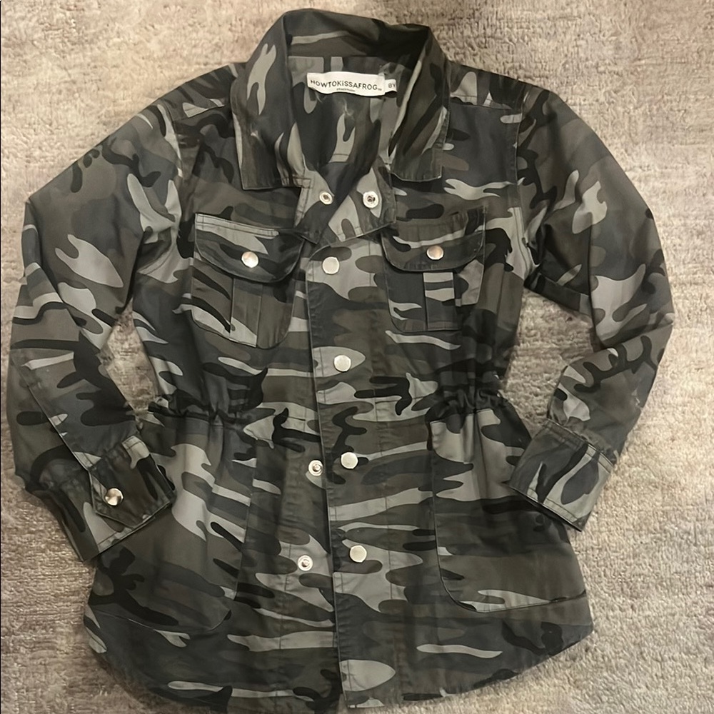 Camouflage girls camo jacket. Like new. Purchased in Stockholm, Sweden